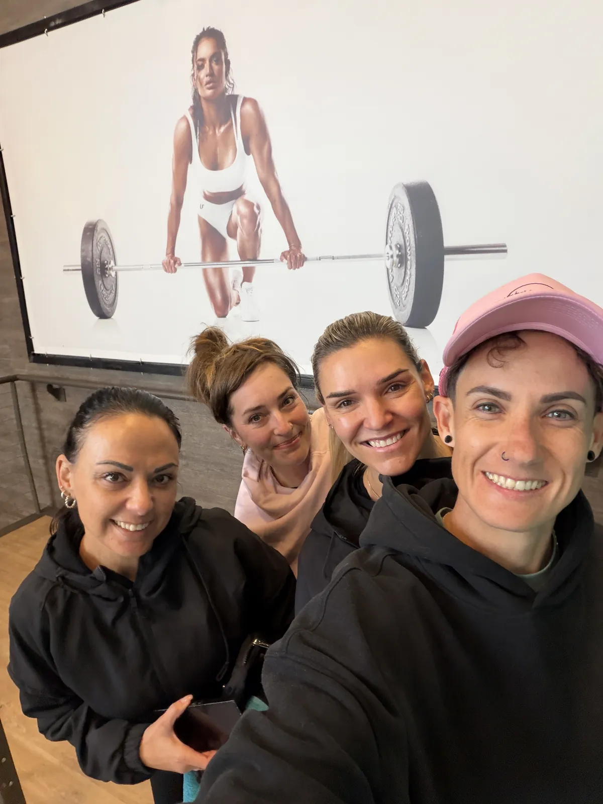 CJ with clients at Barbells & Co